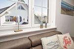 Wohnzimmer - Wohnung 04: Balkon, Boddenblick, Sauna- und Schwimmbadnutzung - Top-Hundeurlaub