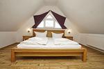 Schlafzimmer - Wohnung 04: Balkon, Boddenblick, Sauna- und Schwimmbadnutzung - Top-Hundeurlaub