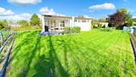 Gartenblick - Ferienhaus Mimibeach in Scharbeutz 350 m zum Strand - Top-Hundeurlaub