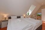 Schlafzimmer - Ferienpark Seepferdchen, Haus Zingst 20a - Top-Hundeurlaub