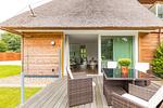 Hauptansicht - Hello Holidays: Sonnenglut | Seeterrasse | Sauna | Park - Top-Hundeurlaub
