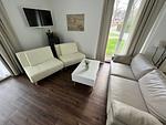 Wohnzimmer - Hello Holidays: Sonnenglut | Seeterrasse | Sauna | Park - Top-Hundeurlaub