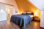 Schlafzimmer - Hello Holidays: Wellenreiter | Penthouse | Sauna | Park - Top-Hundeurlaub