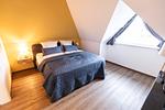 Schlafzimmer - Hello Holidays: Wellenreiter | Penthouse | Sauna | Park - Top-Hundeurlaub