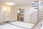 Schlafzimmer mit Zugang zum Duschbad - fewo1846 - StrandNest - Top-Hundeurlaub