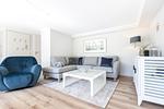 Wohnzimmer - Haus Weissenburg Whg. Garten West - Top-Hundeurlaub
