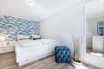 Schlafzimmer - Haus Weissenburg Whg. Garten West - Top-Hundeurlaub