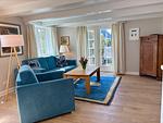 Wohnzimmer - Wohnung 1 West - Top-Hundeurlaub