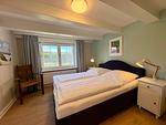 Schlafzimmer - Wohnung 1 West - Top-Hundeurlaub