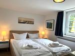 Schlafzimmer - Wohnung 2 Ost - Top-Hundeurlaub