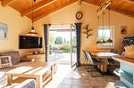 Ferienhaus Blau am See Wohnbereich mit Zugang zur Terasse - Blau am See - Top-Hundeurlaub