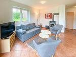 Wohnzimmer - Wohnung (untere) Schöner Urlaub mit Sauna und Kamin - Top-Hundeurlaub