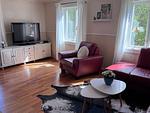 Wohnbereich mit Sitzecke im familienfreundlichen Ferienhaus - Hus Hagagatan - Top-Hundeurlaub