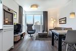 Wohn-/Essbereich mit Sitzgelegenheit - Aparthotel Ostseeallee 1-01 - Top-Hundeurlaub