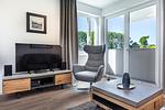 Wohn-/Essbereich mit Zugang zur Terrasse - Aparthotel Ostseeallee 1-01 - Top-Hundeurlaub
