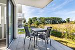 Terrasse mit Zugang zum Wohn-/Essbereich - Aparthotel Ostseeallee 1-01 - Top-Hundeurlaub