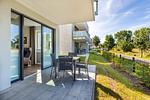 Terrasse mit Zugang zum Wohn-/Essbereich - Aparthotel Ostseeallee 1-01 - Top-Hundeurlaub