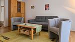 Wohnzimmer - Ferienwohnung Feuerstein - in Hafennähe - Top-Hundeurlaub