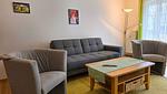 Wohnzimmer - Ferienwohnung Feuerstein - in Hafennähe - Top-Hundeurlaub