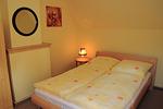 Schlafzimmer - Ferienwohnung Karger - ländlich gelegen im Ort Sagard - Top-Hundeurlaub