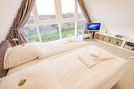 Schlafzimmer - Ferienhaus Heidehüschen - Top-Hundeurlaub