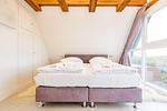Schlafzimmer - Ferienhaus Heidehüschen - Top-Hundeurlaub