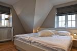 In diesem Schlafzimmer sowie im zweiten Schlafzimmer befinden sich Flachbildfernseher. - Reethuus Alt Wrixum - Top-Hundeurlaub