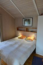 Schlafzimmer mit Doppelbett - Ferienhaus Ausmina - Top-Hundeurlaub