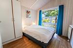 erstes Schlafzimmer mit Einzelbetten - Ferienhaus 12 - Top-Hundeurlaub
