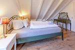 Schlafzimmer - Jolie's Cottage - Top-Hundeurlaub