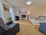 Wohnzimmer - Ferienwohnung Ostseeheim - 1. Reihe mit Meerblick - Top-Hundeurlaub