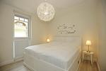 Schlafzimmer mit Doppelbett - Lachs Wohnung 01 - Top-Hundeurlaub