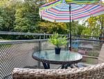 Balkon mit Sonnenschirm - Wohnung 12 - Top-Hundeurlaub