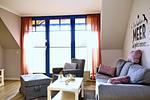 Sofa, Sessel und Hocker im Wohnzimmer - Wohnung 14-5 - Top-Hundeurlaub