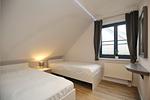 erstes Schlafzimmer mit Einzelbetten - Wohnung 14-5 - Top-Hundeurlaub