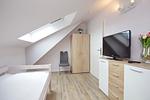 Kleiderschrank und TV  im zweiten Schlafzimmer - Wohnung 14-5 - Top-Hundeurlaub