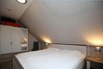 drittes Schlafzimmer mit Doppelbett und Kleiderschrank - Wohnung 14-5 - Top-Hundeurlaub