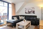 Wohnzimmer mit Sofaecke - Wohnung 08-5 - Top-Hundeurlaub