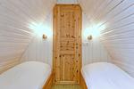 erstes Schlafzimmer mit Einzelbetten - Finnhütte 02 - Top-Hundeurlaub