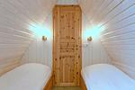 erstes Schlafzimmer mit Einzelbetten - Finnhütte 01 - Top-Hundeurlaub
