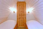 erstes Schlafzimmer mit Einzelbetten - Finnhütte 05 - Top-Hundeurlaub