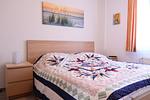 Schlafzimmer mit Doppelbett - Wohnung 029 - Top-Hundeurlaub