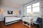 Wohnbereich mit Schlafcouch - Wohnung 49 - Top-Hundeurlaub