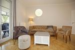 Wohnzimmer mit Sitzecke - Wohnung 02 - Top-Hundeurlaub