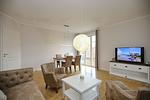 Wohnzimmer mit TV - Wohnung 04 - Top-Hundeurlaub