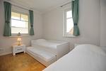 2. Schlafzimmer mit Einzelbetten und Ausziehbett - Wohnung 04 - Top-Hundeurlaub