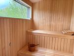 Holzsauna mit skandinavischem Ambiente im CIRCUITUS Småland - CIRCUITUS - Top-Hundeurlaub