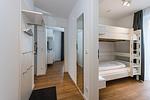 Schlafzimmer mit Etagenbett - Deichhäuser Anna Küste 8-20 - Top-Hundeurlaub