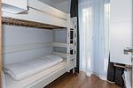 Schlafzimmer mit Etagenbett - Deichhäuser Anna Küste 8-20 - Top-Hundeurlaub