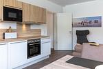 Wohn-/Essbereich mit Küchenzeile - Aparthotel Ostseeallee 2-18 - Top-Hundeurlaub